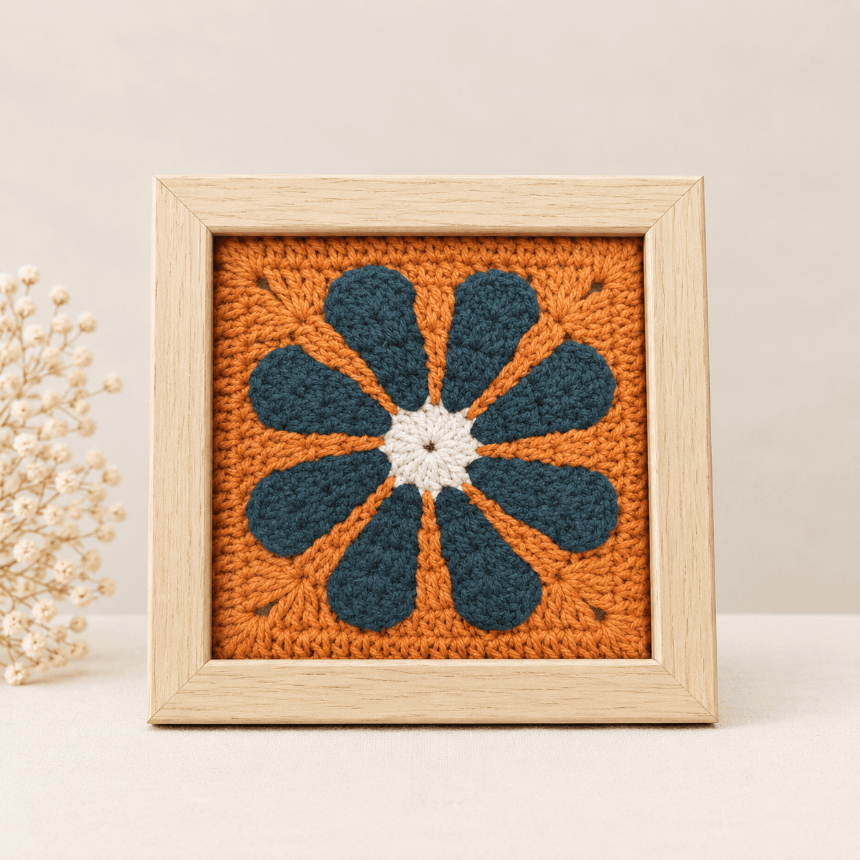 Teal daisy on orange, light frame