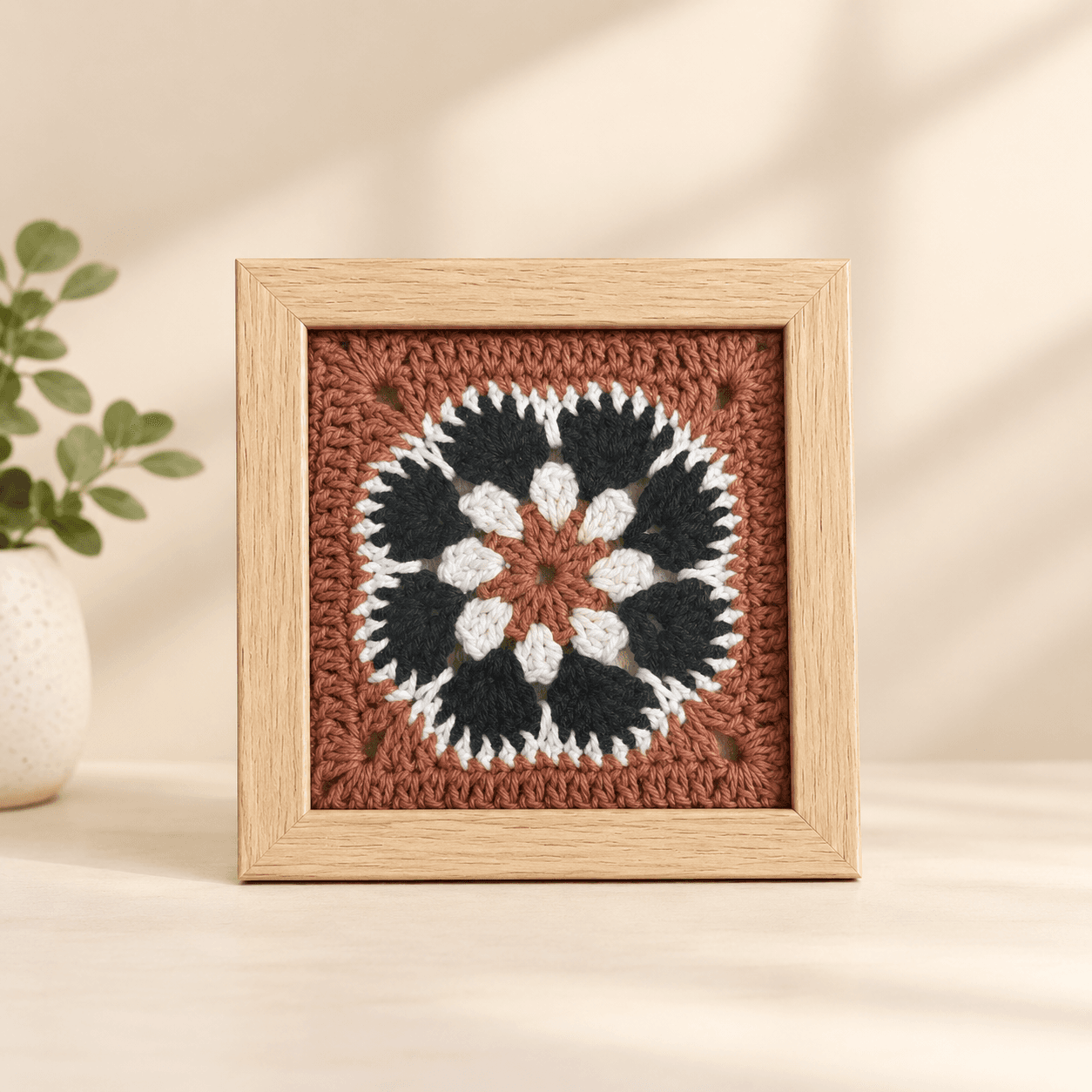Navy garden on terracotta, light frame